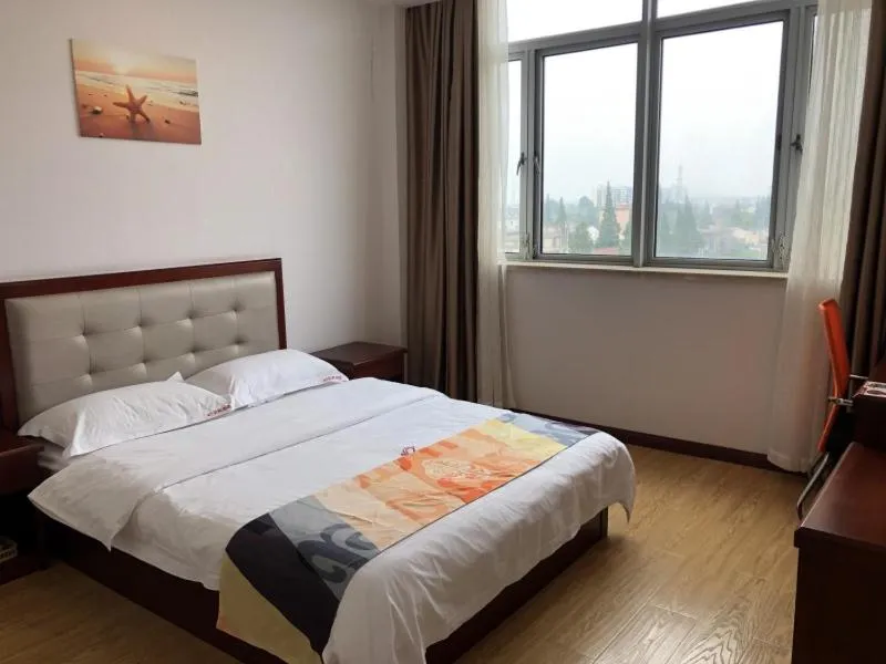 Bed in Shell Shanghai Jinshan Zhanyan Songjin Highway Hotel