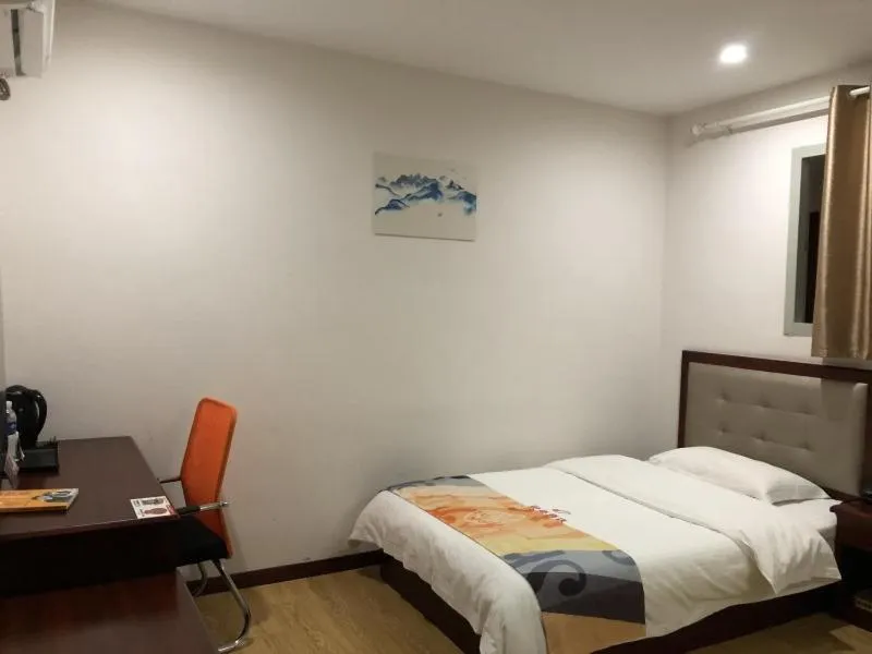 Bed in Shell Shanghai Jinshan Zhanyan Songjin Highway Hotel