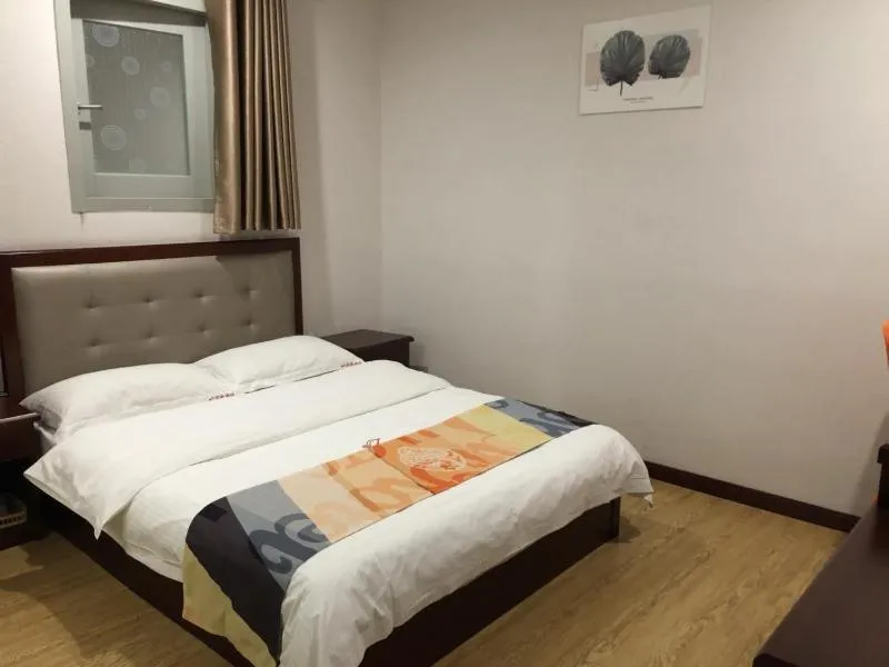 Bed in Shell Shanghai Jinshan Zhanyan Songjin Highway Hotel
