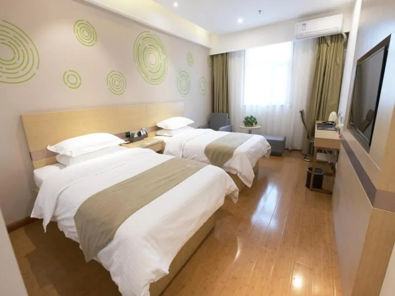Bed in GreenTree Inn Zhengzhou Fangte Green Expo Park Shangdu Road Express Hotel