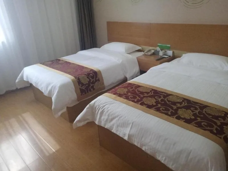 Bed in GreenTree Inn Hefei Huainan Road Huaihe Garden Express Hotel