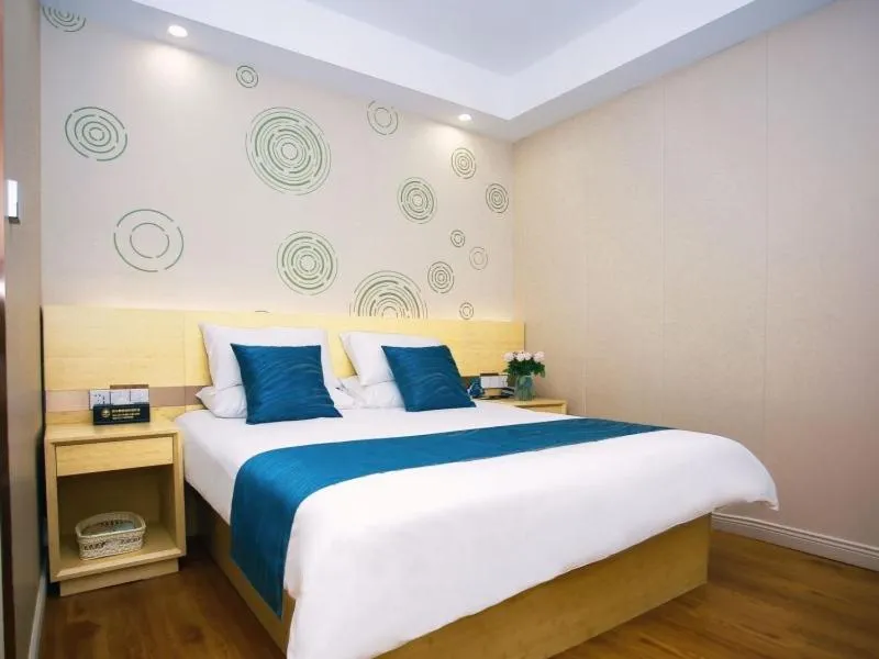 Bed in GreenTree Inn NantongHaian Development Zone Chengdong Town Express Hotel