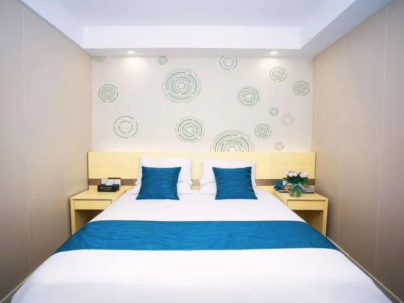 Bed in GreenTree Inn NantongHaian Development Zone Chengdong Town Express Hotel