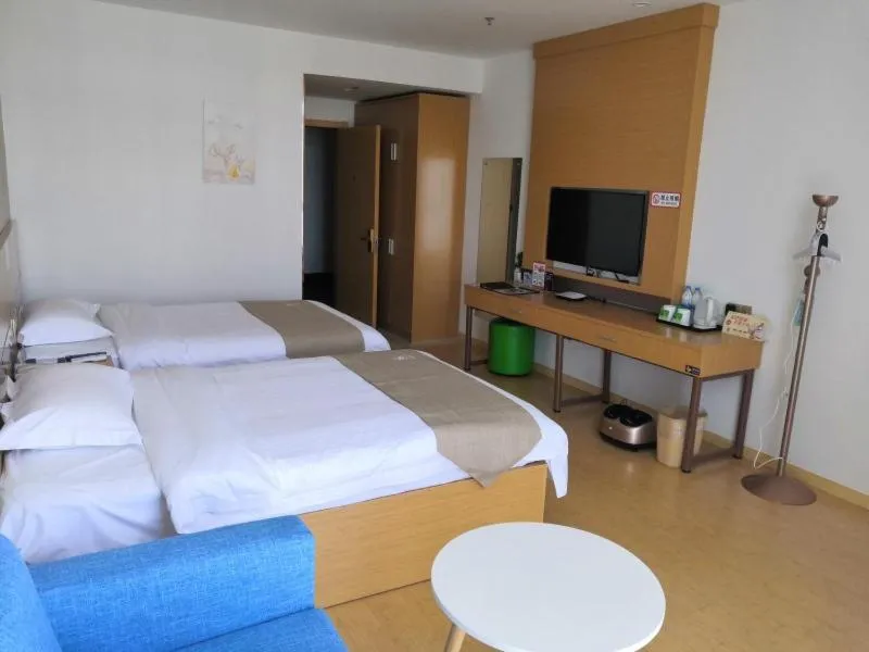 Bed in GreenTree Inn Shanghai Jinshan District Wanda Plaza Longhao Road Express Hotel