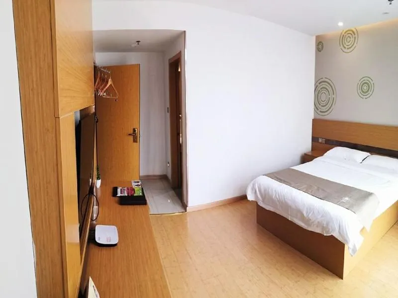 Bed in GreenTree Inn Shanghai Jinshan District Wanda Plaza Longhao Road Express Hotel