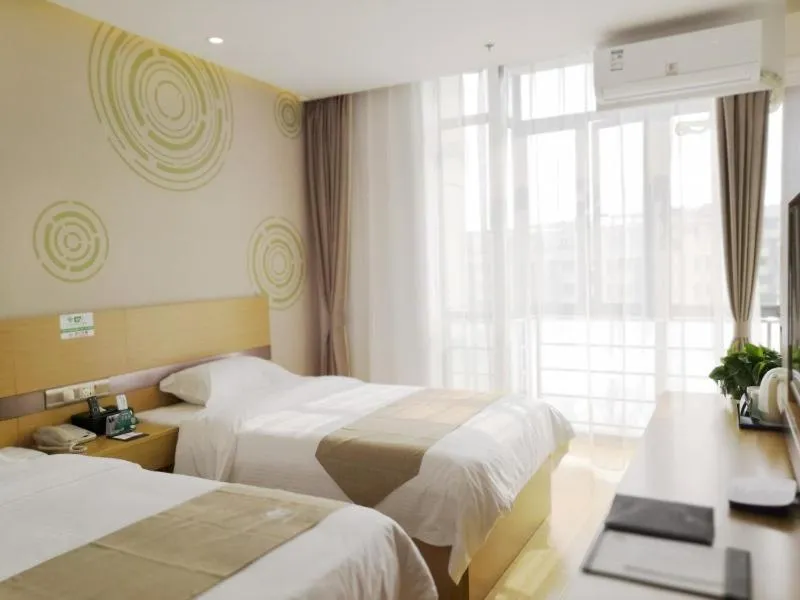 Bed in GreenTree Inn Shanghai Jinshan District Wanda Plaza Longhao Road Express Hotel