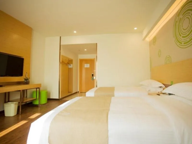 Bed in GreenTree Inn Jinan Tangye Express Hotel