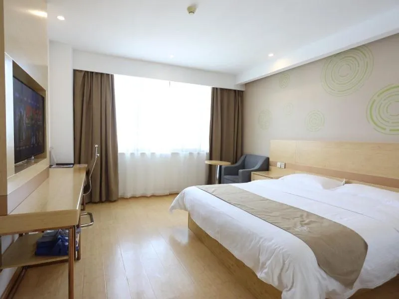 Bed in GreenTree Inn Suzhou Caohu Industrial Park Express Hotel