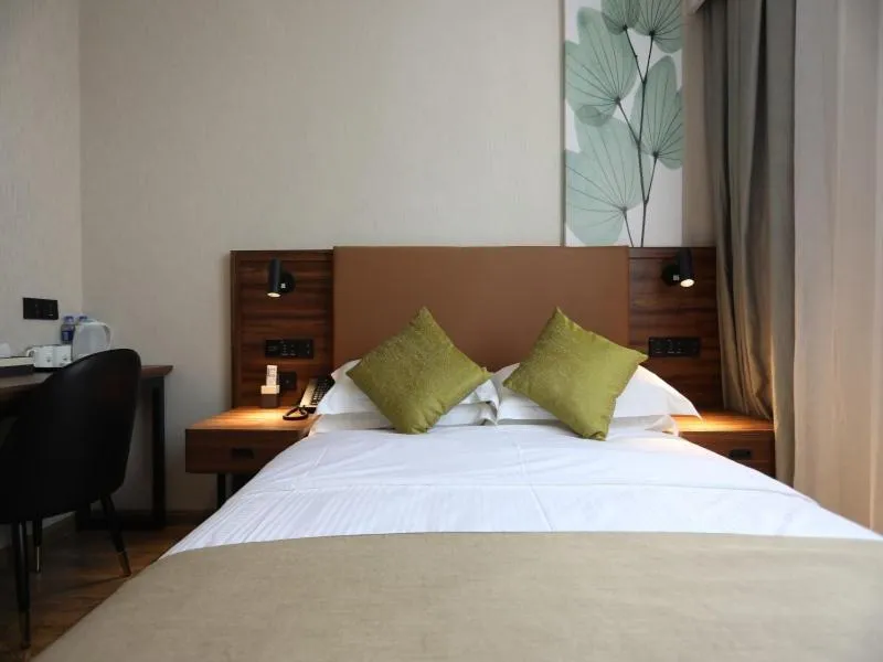 Bed in GreenTree Inn Suzhou Caohu Industrial Park Express Hotel