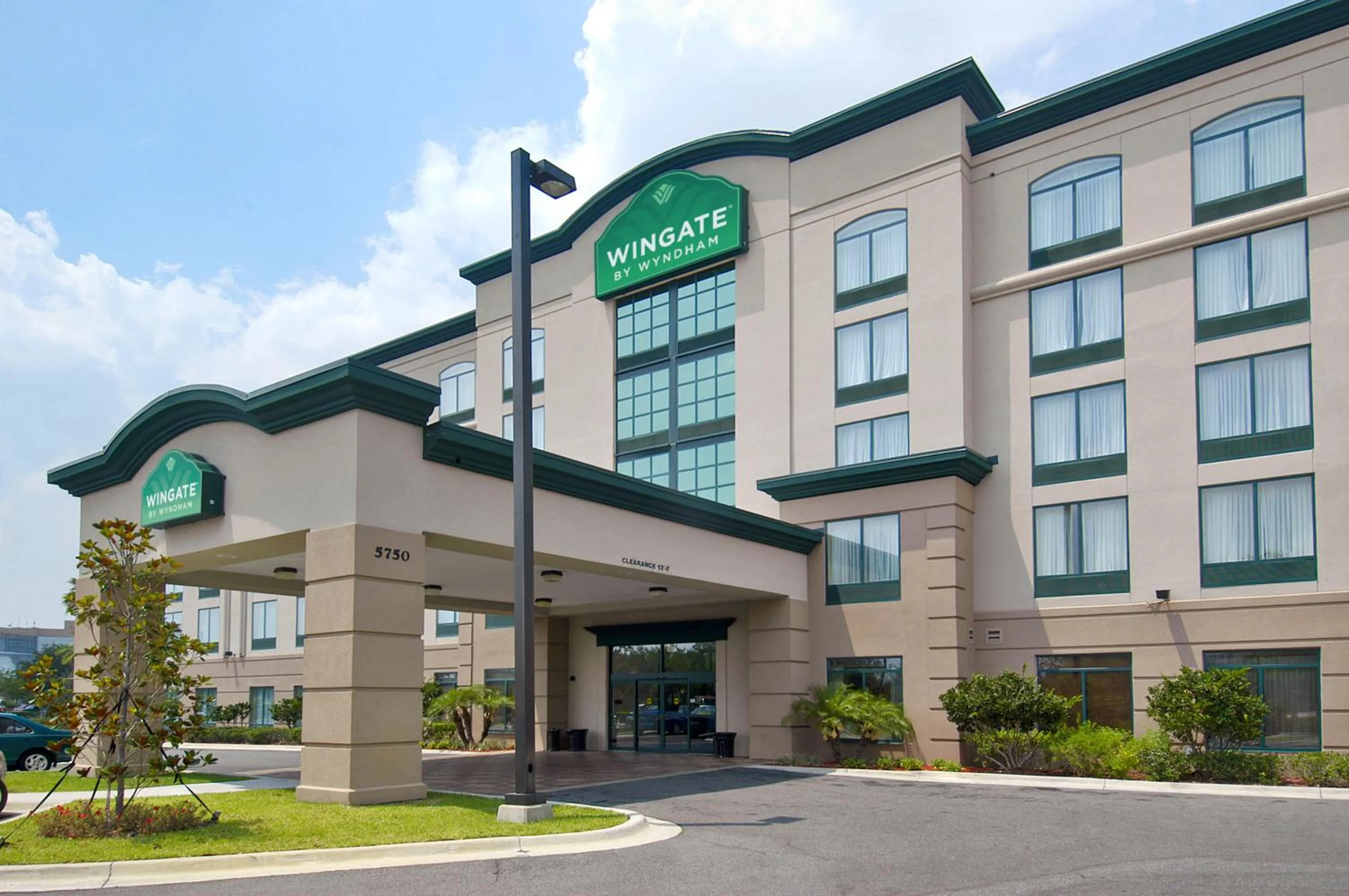 Facade/entrance in Wingate By Wyndham - Orlando International Airport- Free Hot Breakfast