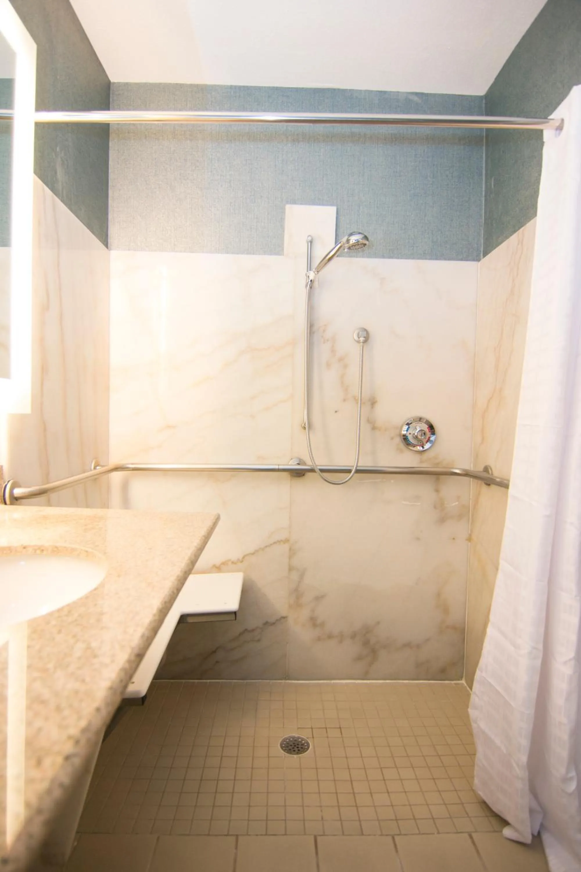 Bathroom in Wingate By Wyndham - Orlando International Airport- Free Hot Breakfast