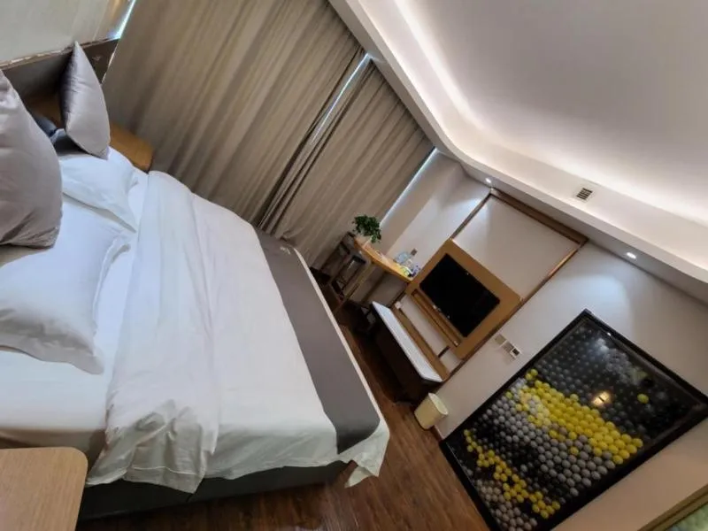 Bed in GreenTree Eastern Rizhao High Speed Railway Station Hotel