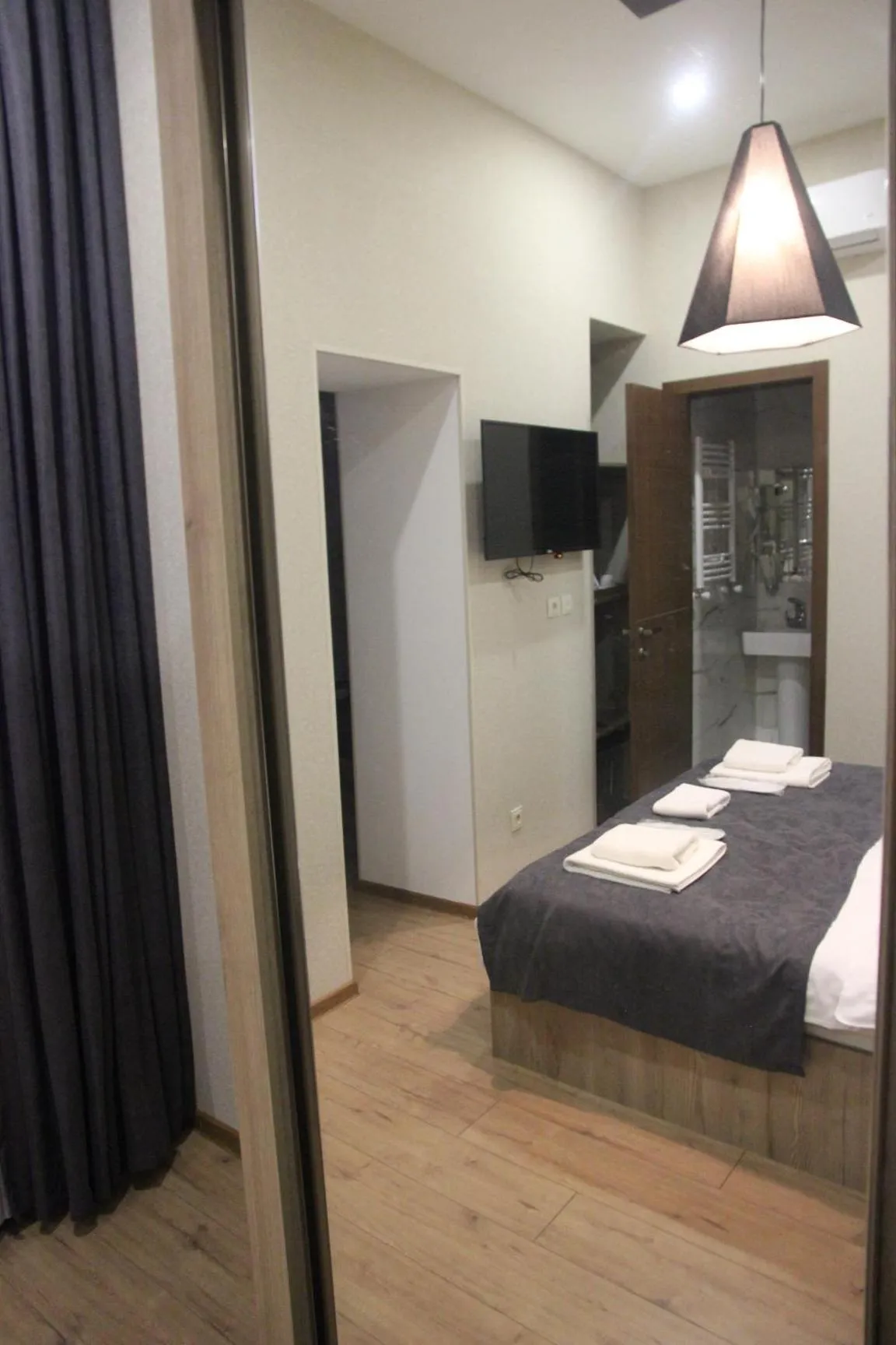 Bed in City Heart Hotel