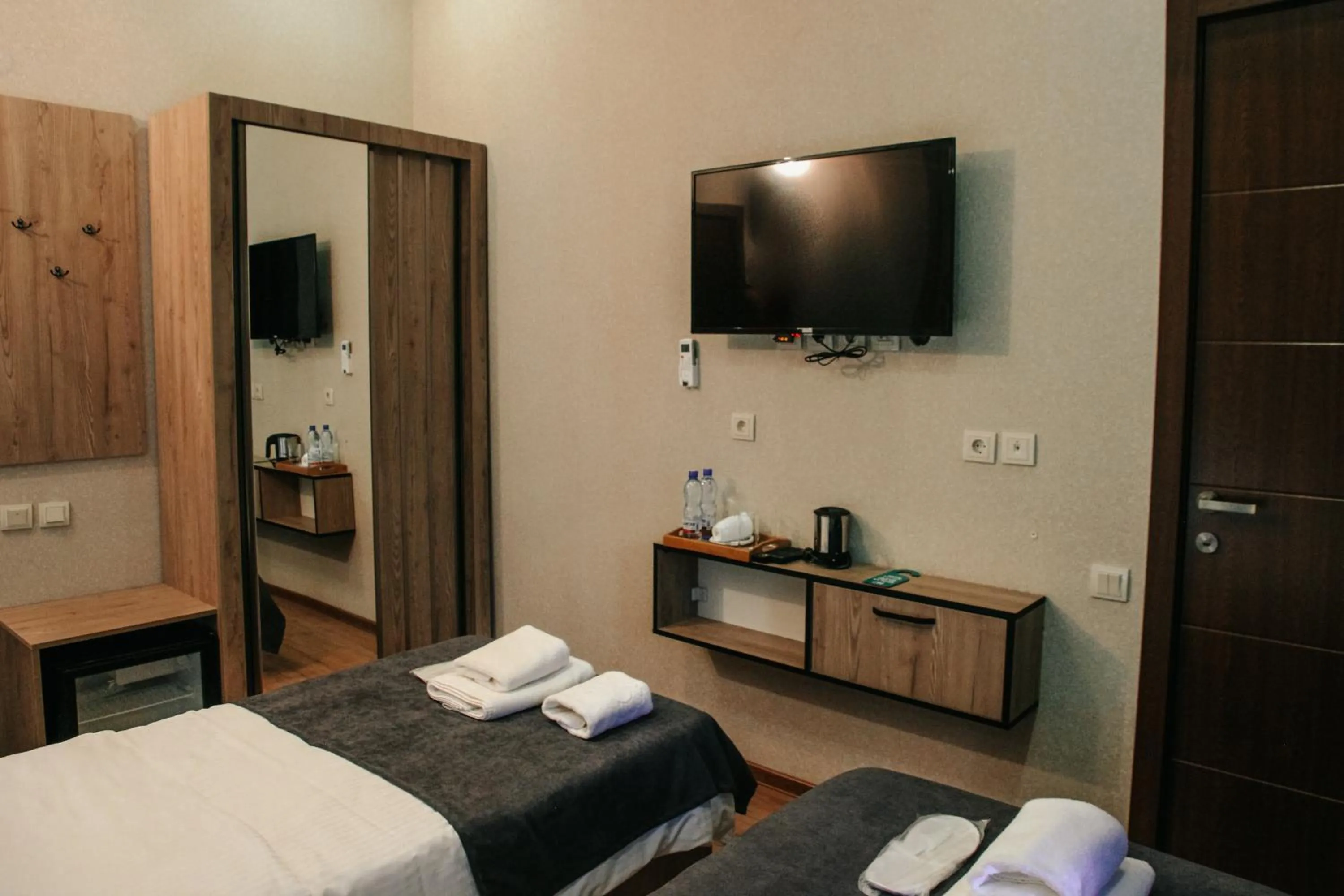 Bed in City Heart Hotel