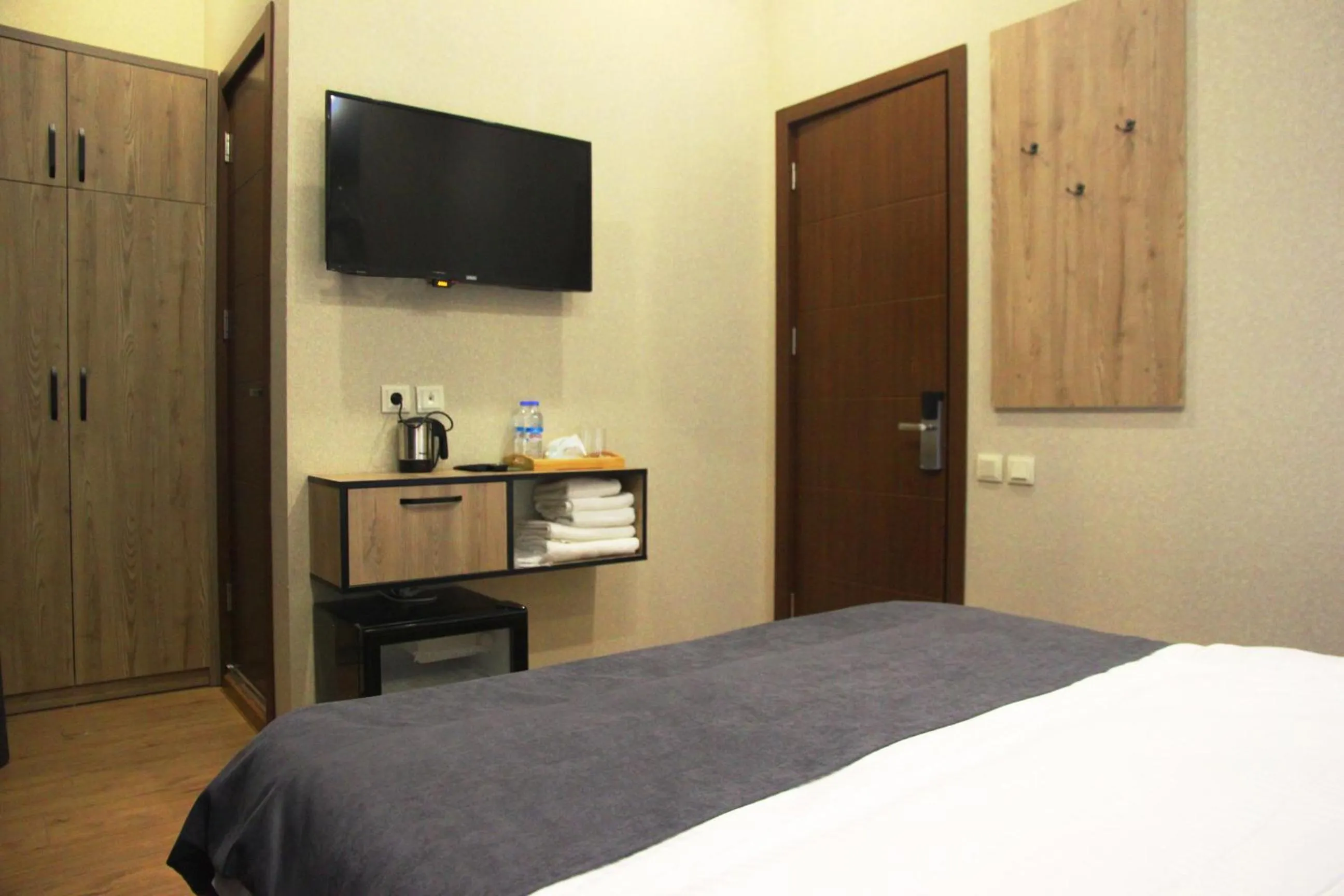 Bed in City Heart Hotel