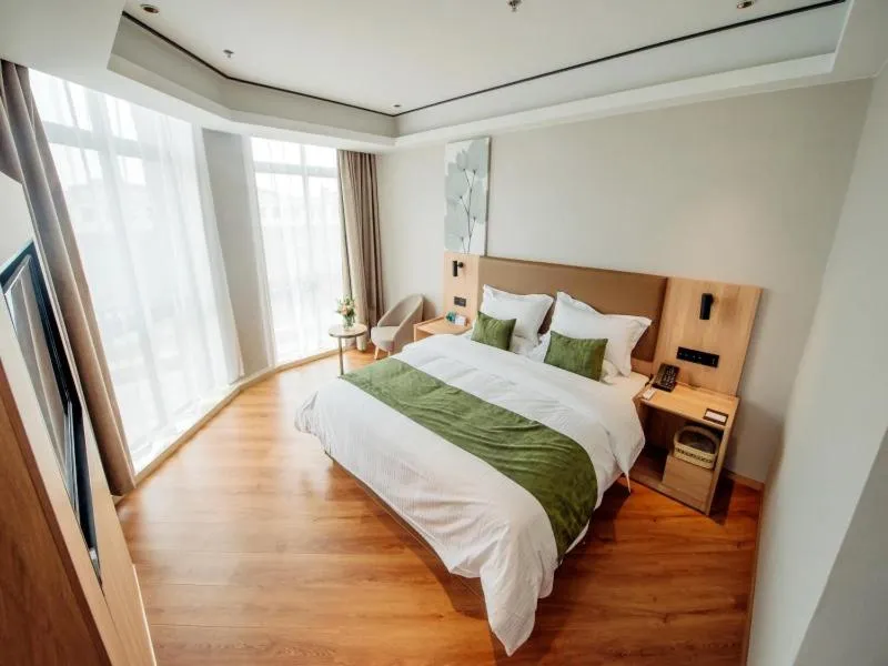 Bed in GreenTree Inn Taizhou Xinghua City Zhouzhuang Town Business Hotel