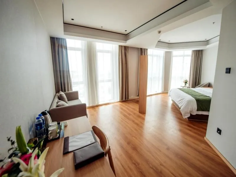 Bed in GreenTree Inn Taizhou Xinghua City Zhouzhuang Town Business Hotel