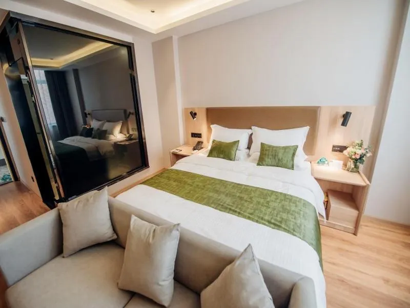 Bed in GreenTree Inn Taizhou Xinghua City Zhouzhuang Town Business Hotel