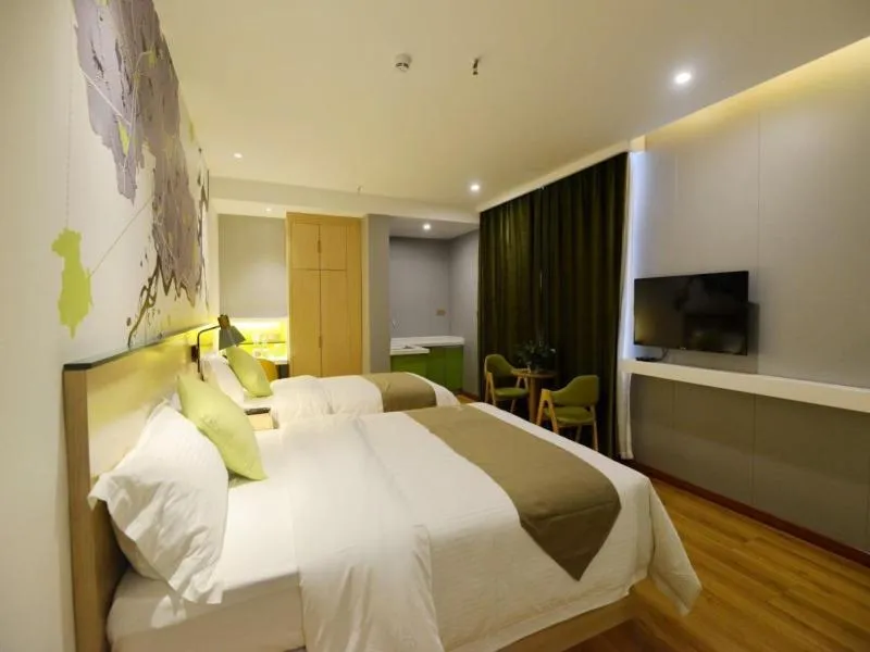 Bed in Vatica Huanggang Luotian County City Square Hotel