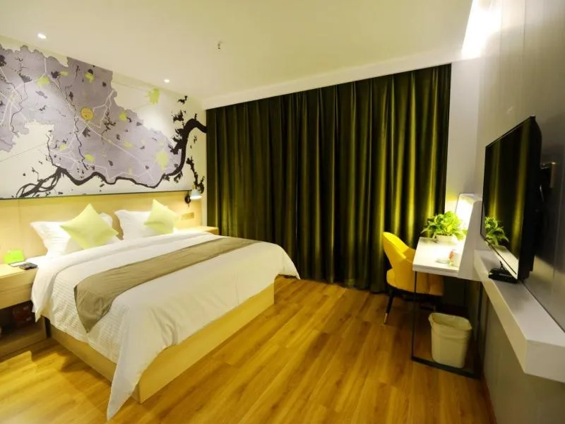Bed in Vatica Huanggang Luotian County City Square Hotel