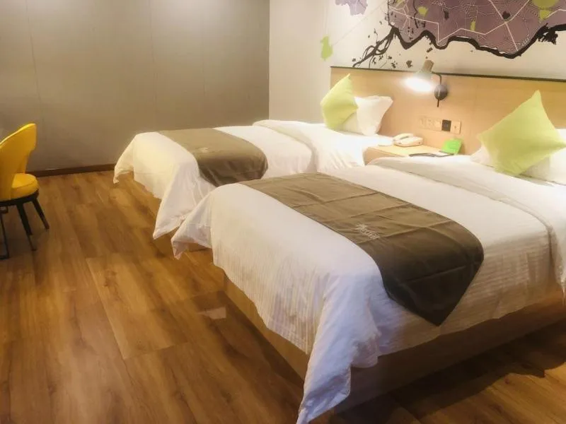 Bed in Vatica Huanggang Luotian County City Square Hotel