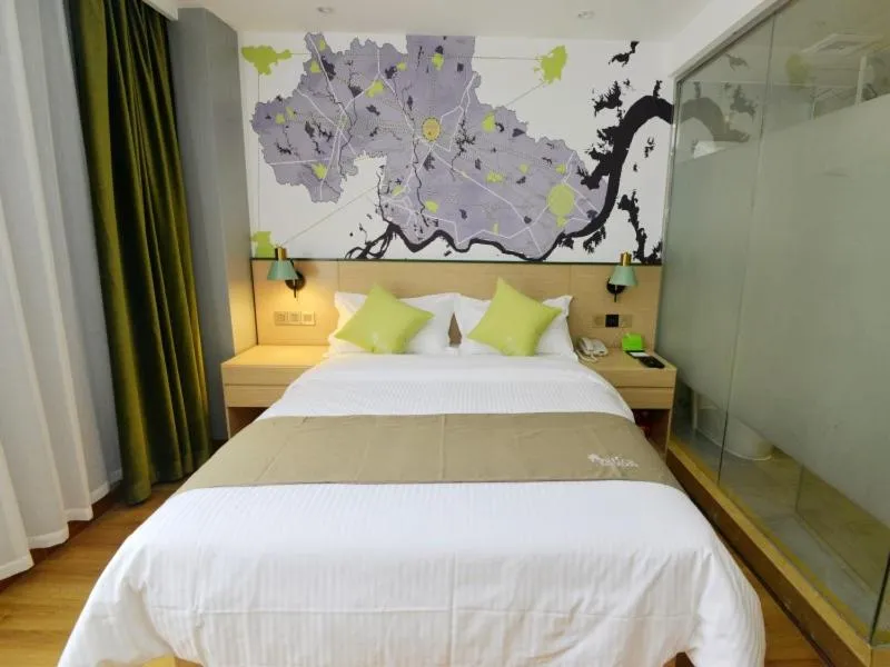 Bed in Vatica Huanggang Luotian County City Square Hotel