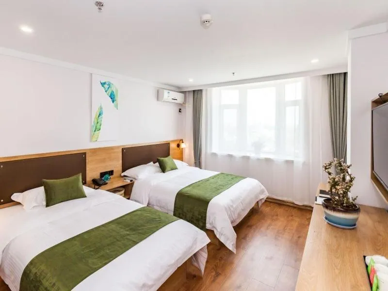 Bed in GreenTree Inn Dalian Airport New District Xinzhaizi Express Hotel