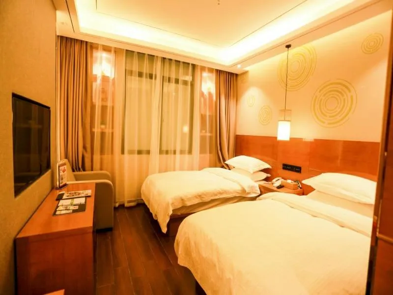 Bed in GreenTree Inn Anshun Guansuo Avenue Hotel