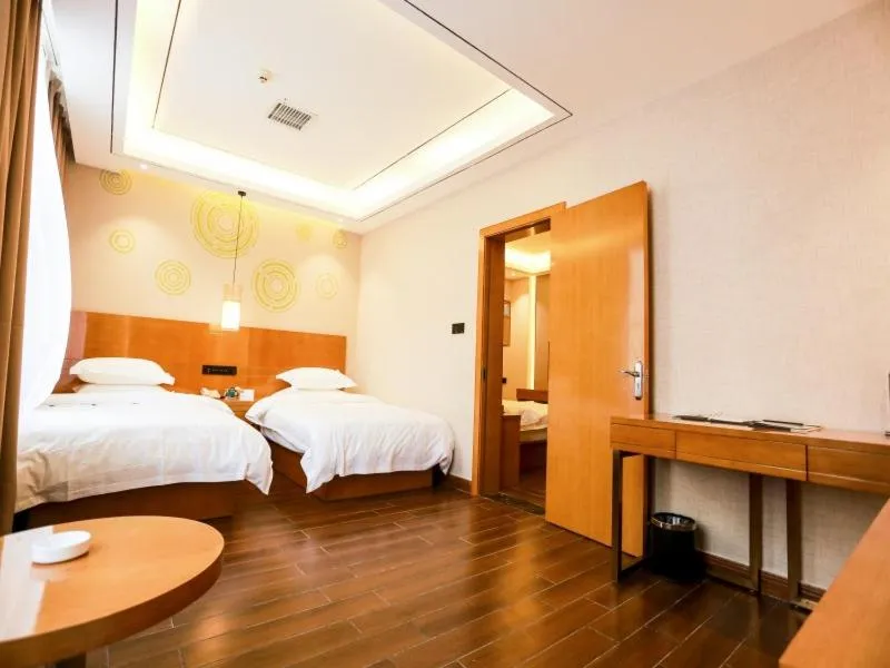 Bed in GreenTree Inn Anshun Guansuo Avenue Hotel