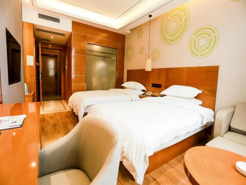 Bed in GreenTree Inn Anshun Guansuo Avenue Hotel