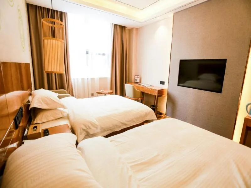 Bed in GreenTree Inn Anshun Guansuo Avenue Hotel