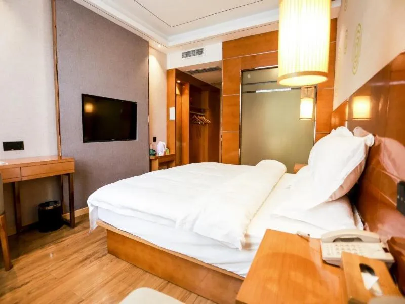 Bed in GreenTree Inn Anshun Guansuo Avenue Hotel