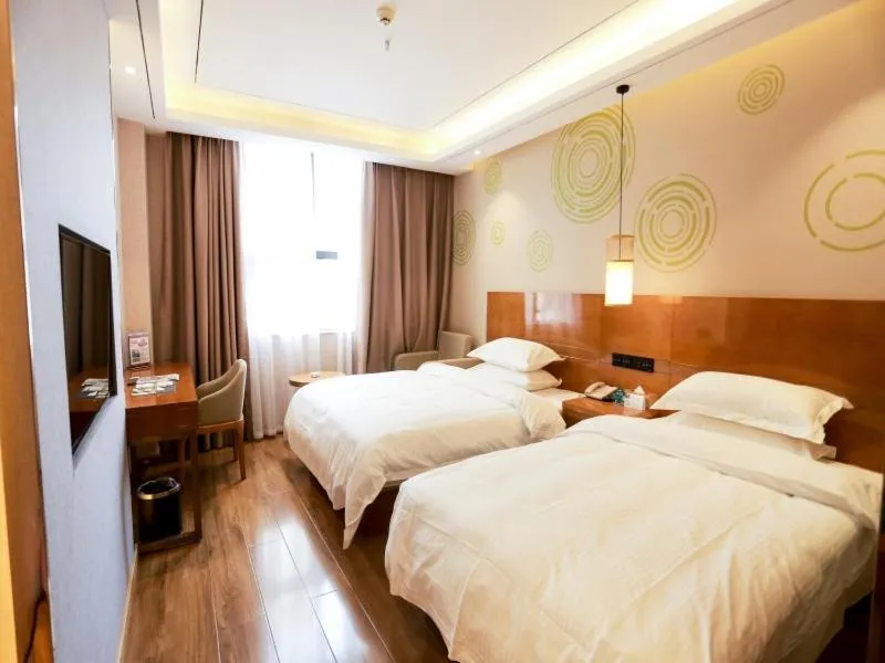 Bed in GreenTree Inn Anshun Guansuo Avenue Hotel