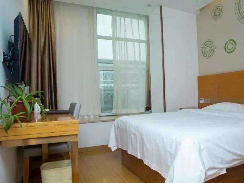 Bed in GreenTree Inn Yangzhou Railway Station Jinzhankou Business Hotel