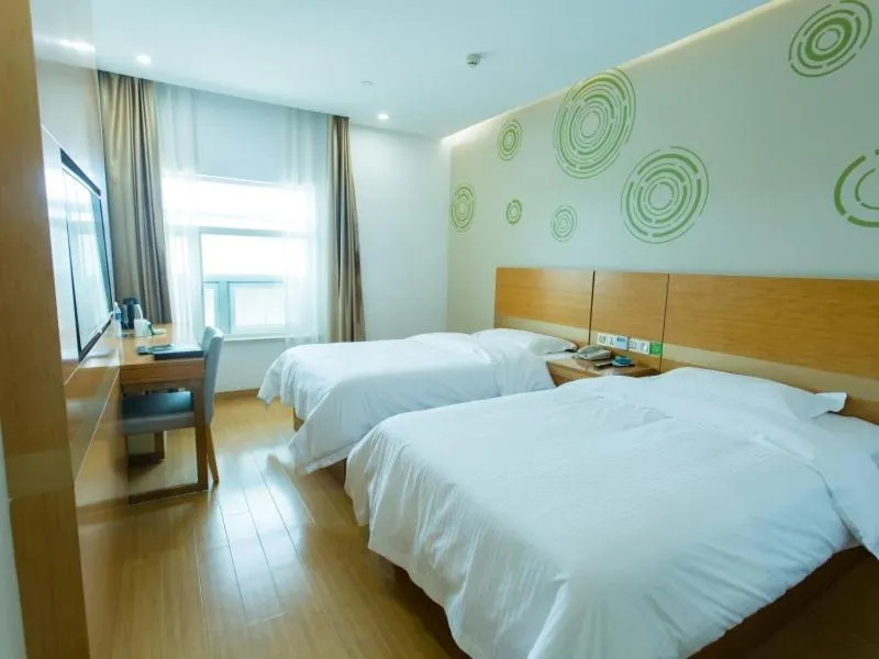 Bed in GreenTree Inn Yangzhou Railway Station Jinzhankou Business Hotel