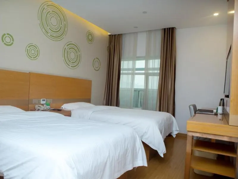 Bed in GreenTree Inn Yangzhou Railway Station Jinzhankou Business Hotel