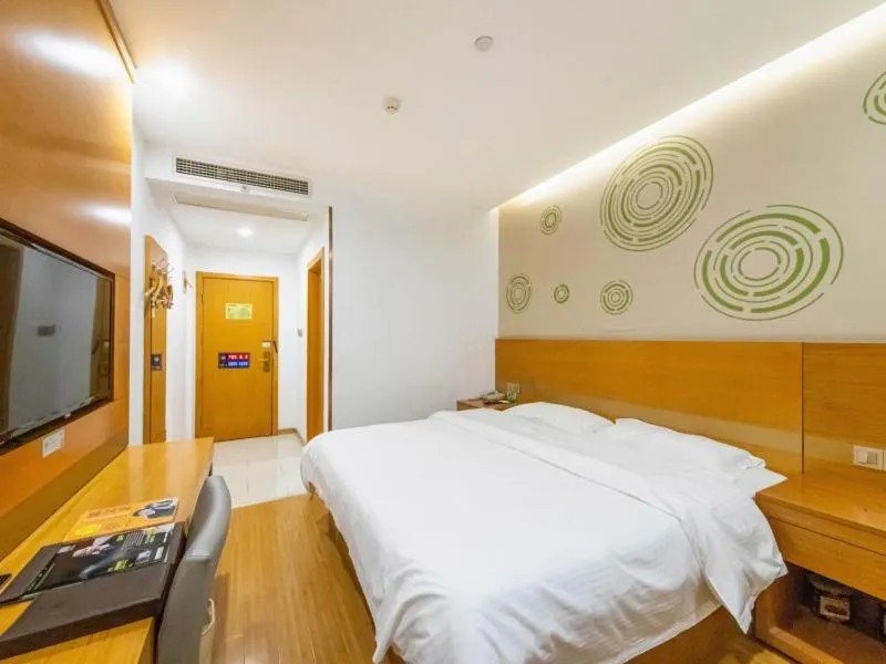 Bed in GreenTree Inn Yangzhou Railway Station Jinzhankou Business Hotel