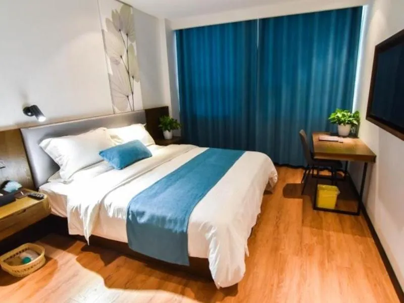 Bed in GreenTree Rizhao Lanshan Coach Station Hotel