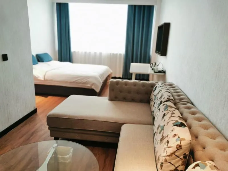 Bed in GreenTree Rizhao Lanshan Coach Station Hotel