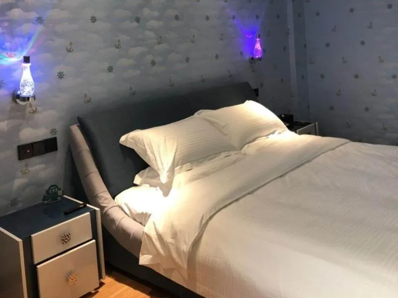 Bed in GreenTree Rizhao Lanshan Coach Station Hotel