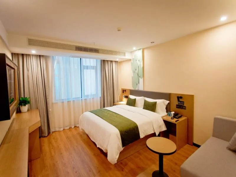 Bed in GreenTree Inn Fuyang City Yingzhou District Kuixing Road Business Hotel