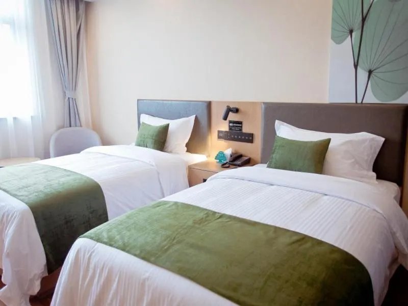 Bed in GreenTree Inn Fuyang City Yingzhou District Kuixing Road Business Hotel
