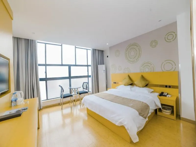 Bed in GreenTree Inn Suzhou Zhangjiagang City Jingang Town Express Hotel