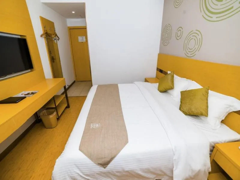 Bed in GreenTree Inn Suzhou Zhangjiagang City Jingang Town Express Hotel