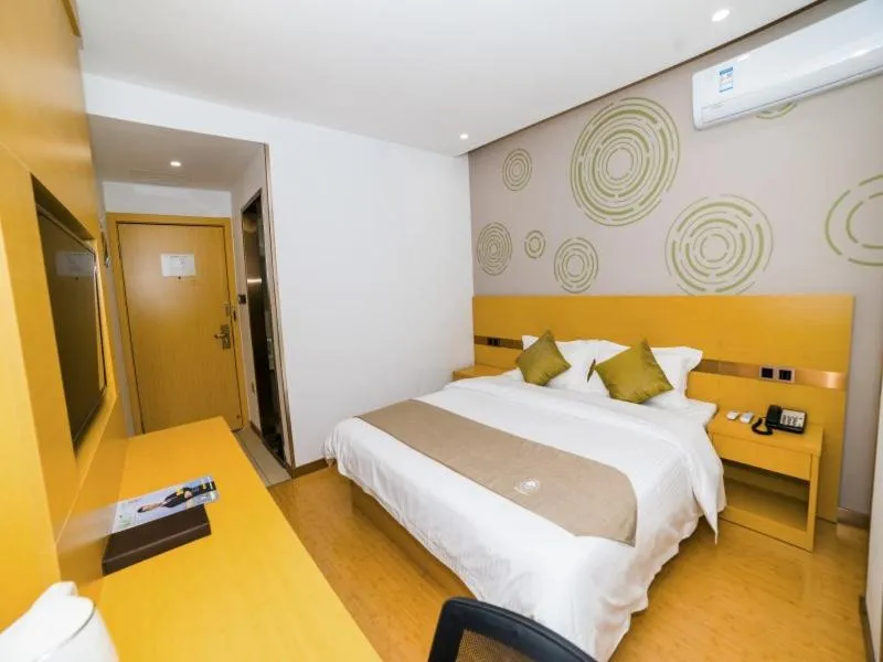 Bed in GreenTree Inn Suzhou Zhangjiagang City Jingang Town Express Hotel