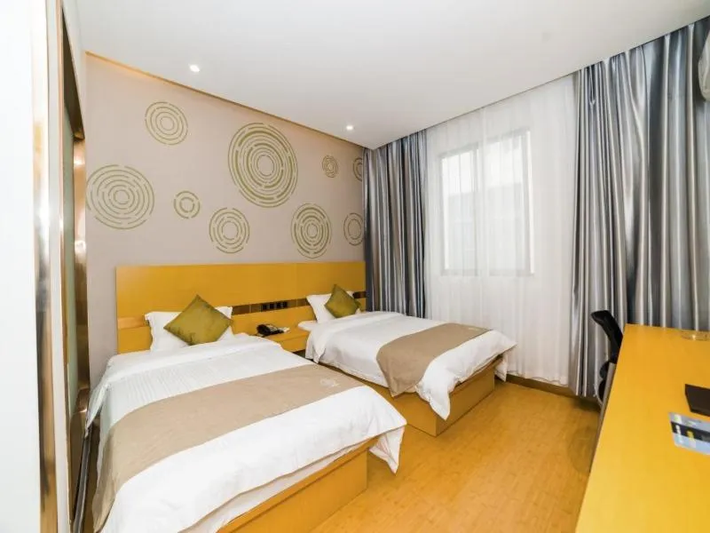 Bed in GreenTree Inn Suzhou Zhangjiagang City Jingang Town Express Hotel
