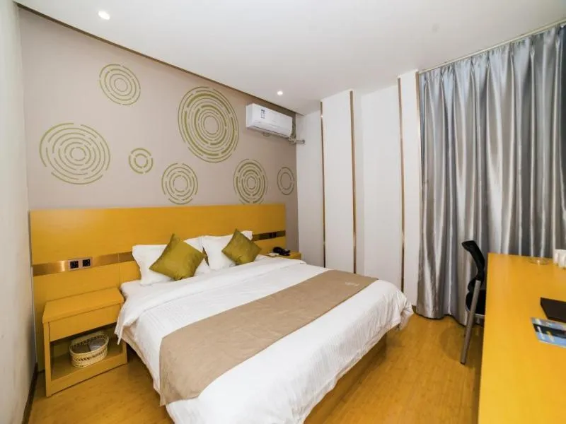 Bed in GreenTree Inn Suzhou Zhangjiagang City Jingang Town Express Hotel