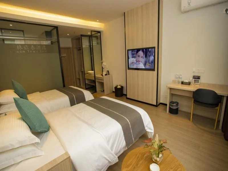 Bed in GreenTree Inn Yulin Exhibition Center Darunfa Hotel