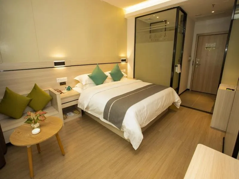 Bed in GreenTree Inn Yulin Exhibition Center Darunfa Hotel