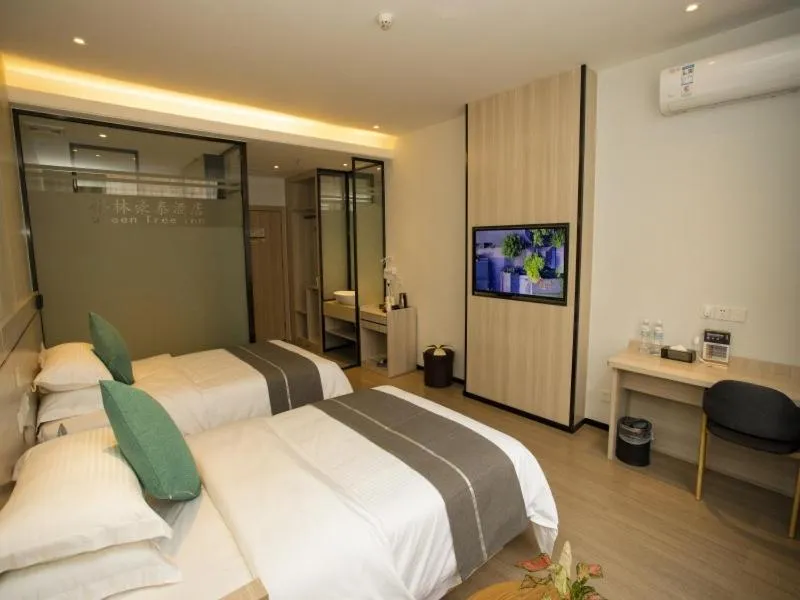 Bed in GreenTree Inn Yulin Exhibition Center Darunfa Hotel